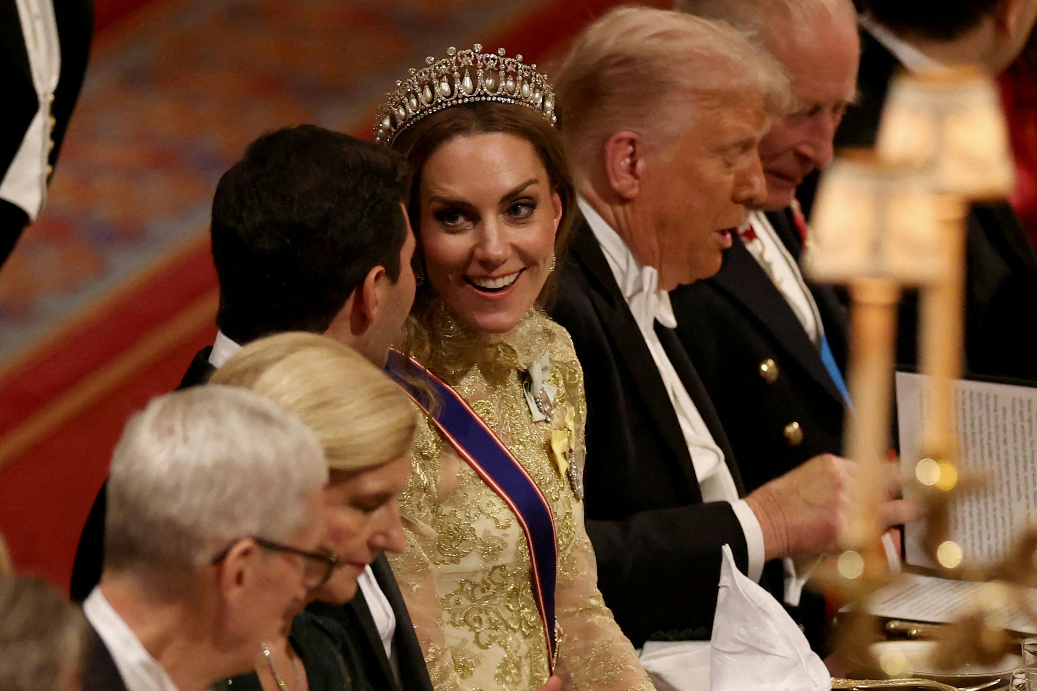 Britain's Catherine, Princess of Wales speaks with Michael Boulos at a State Banquet at Windsor Castle, in Windsor, on September 17, 2025, during the second State Visit of US President Donald Trump. US President Donald Trump arrived in Britain for an unprecedented second State Visit, with the UK government rolling out a royal red carpet welcome to win over the mercurial leader. (Photo by Phil Noble / POOL / AFP)