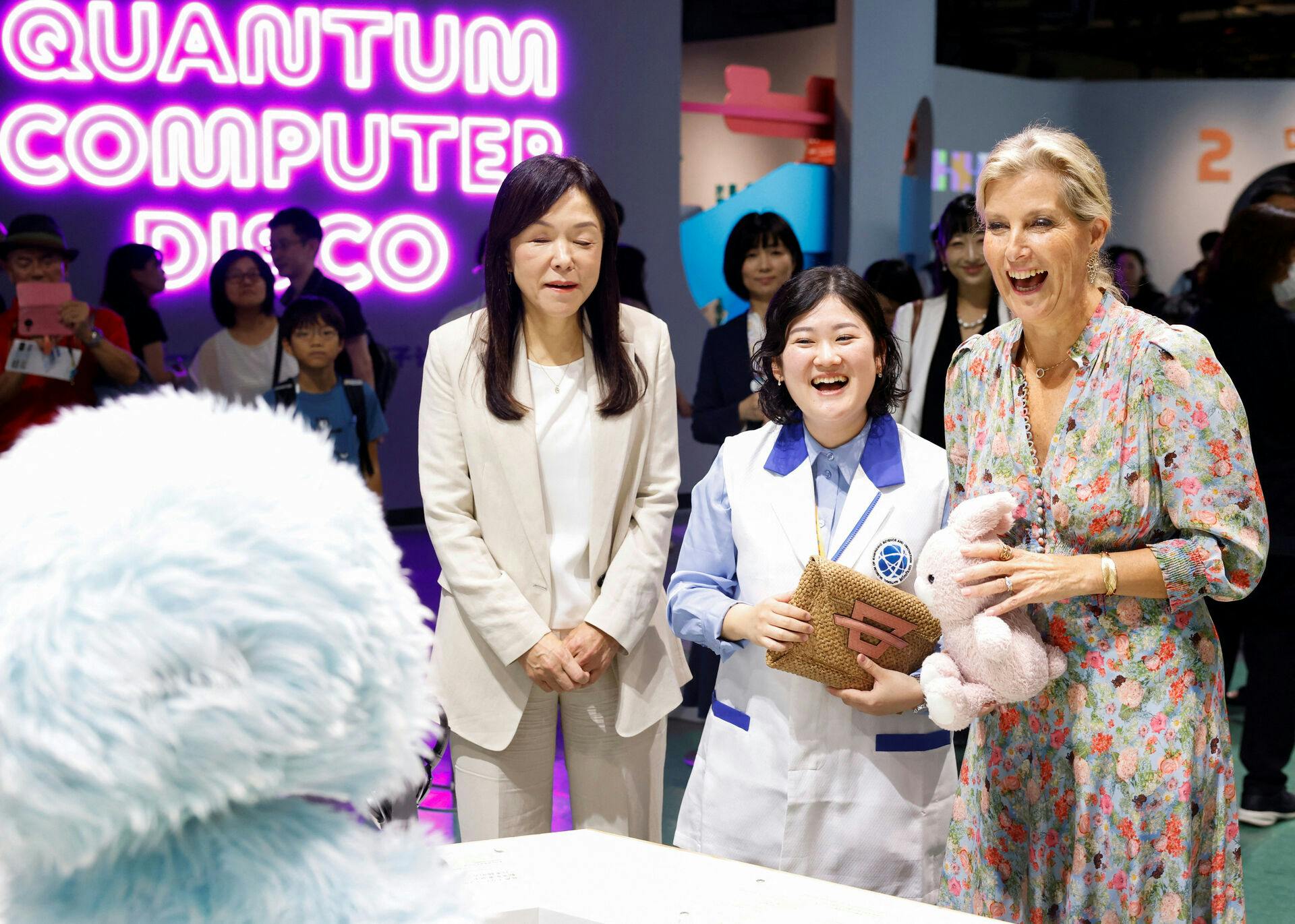 Britain's Sophie, Duchess of Edinburgh, play with robot as she visits the National Museum of Emerging Science and Innovation (Miraikan) in Tokyo, Japan September 20, 2025. REUTERS/Manami Yamada