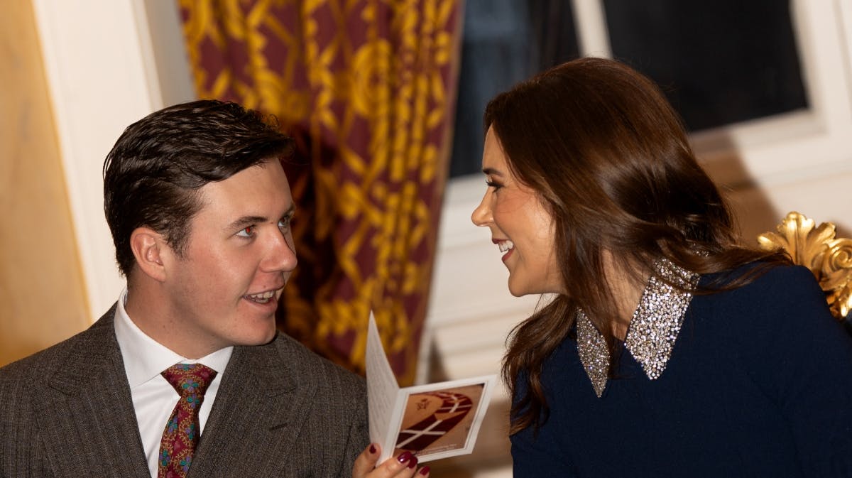 Kronprins Christian og dronning Mary under kongeparrets julearrangement på Christiansborg Slot.