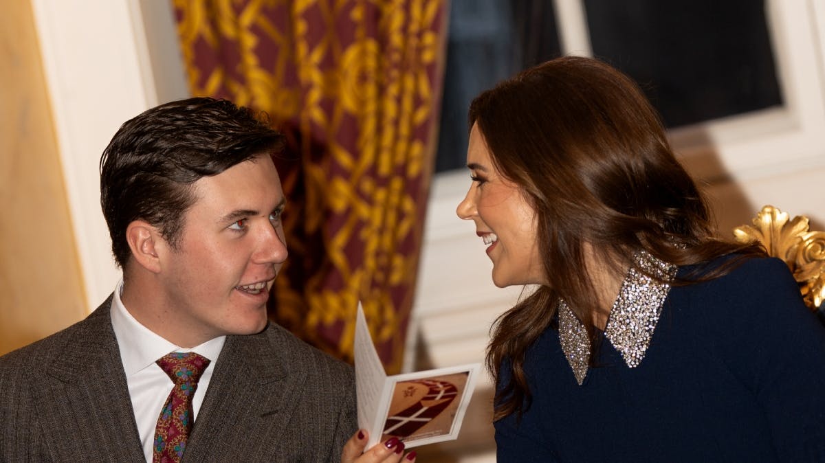 Kronprins Christian og dronning Mary under kongeparrets julearrangement på Christiansborg Slot.