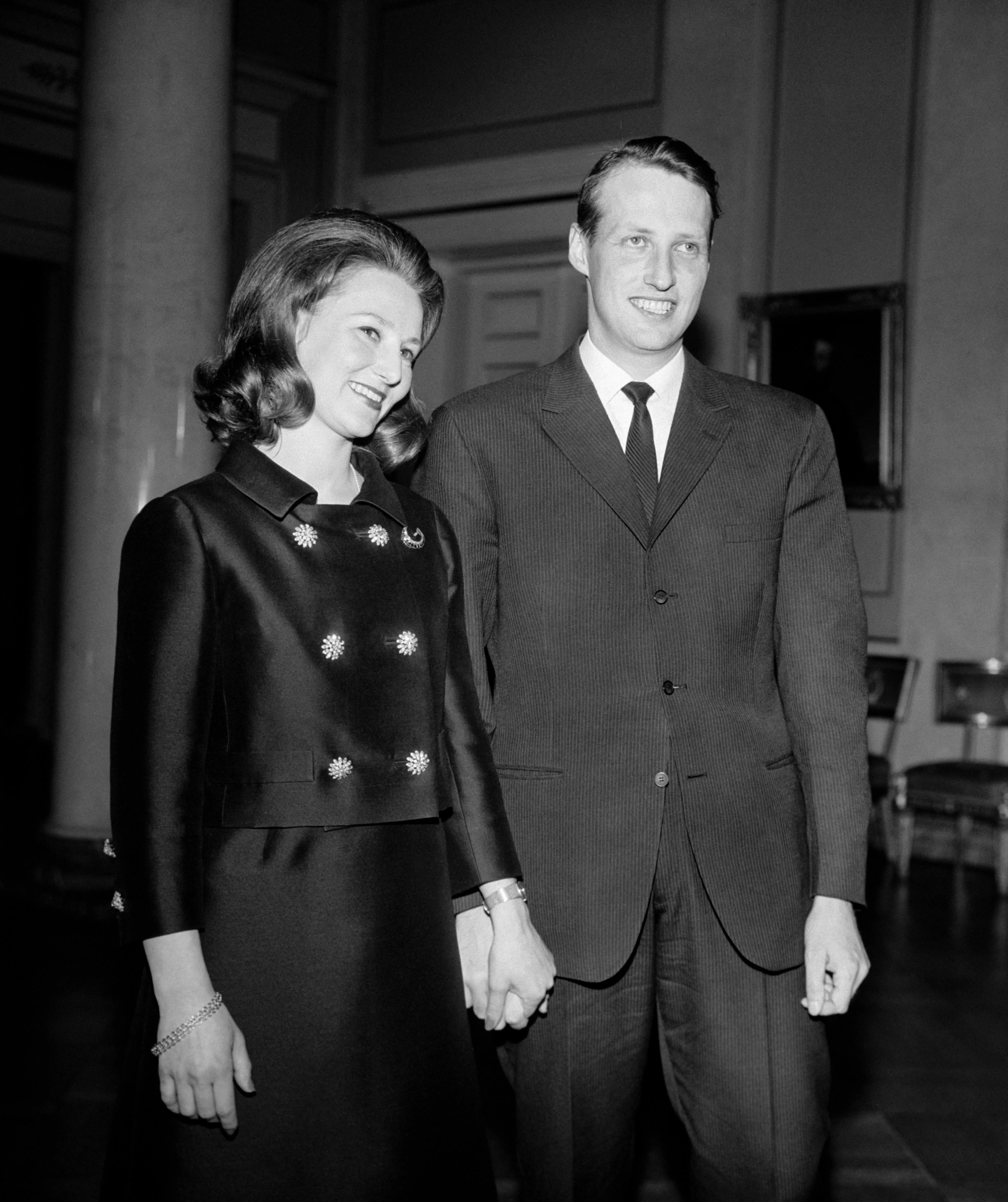 Norway's Crown Prince Harald and Sonja Haraldsen pose for photographers after the announcement of their engagement, in March 1968 in Oslo. NTB / AFP