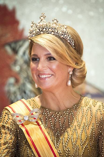 Dronning Maxima med kong Willem-Alexander til banket på det japanske kejserpalads.