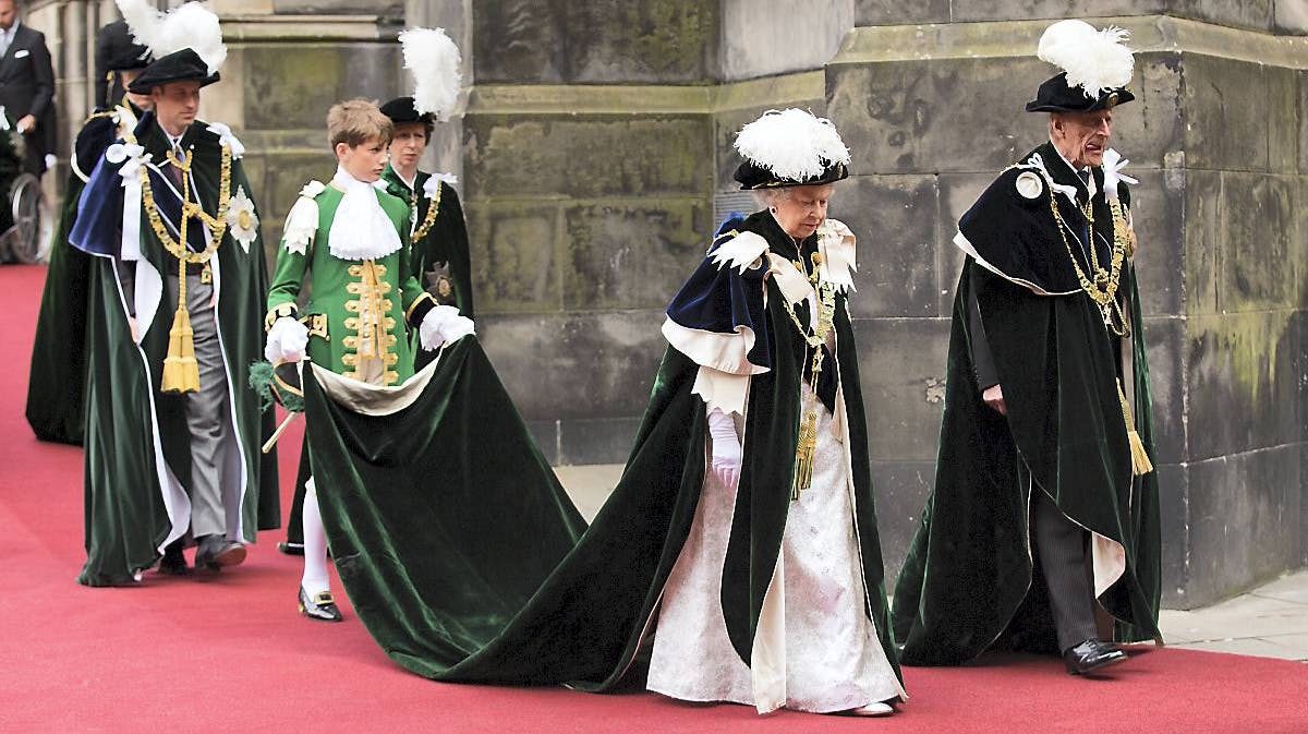 Dronning Elizabeth, prins Philip og prins William.