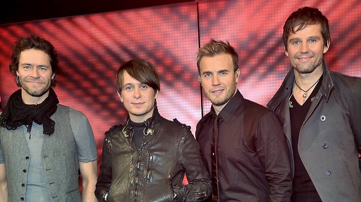 Take That med Jason Orange til højre.